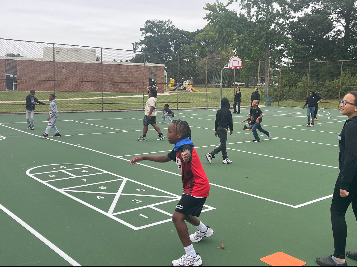 Students participating in basketball activities
