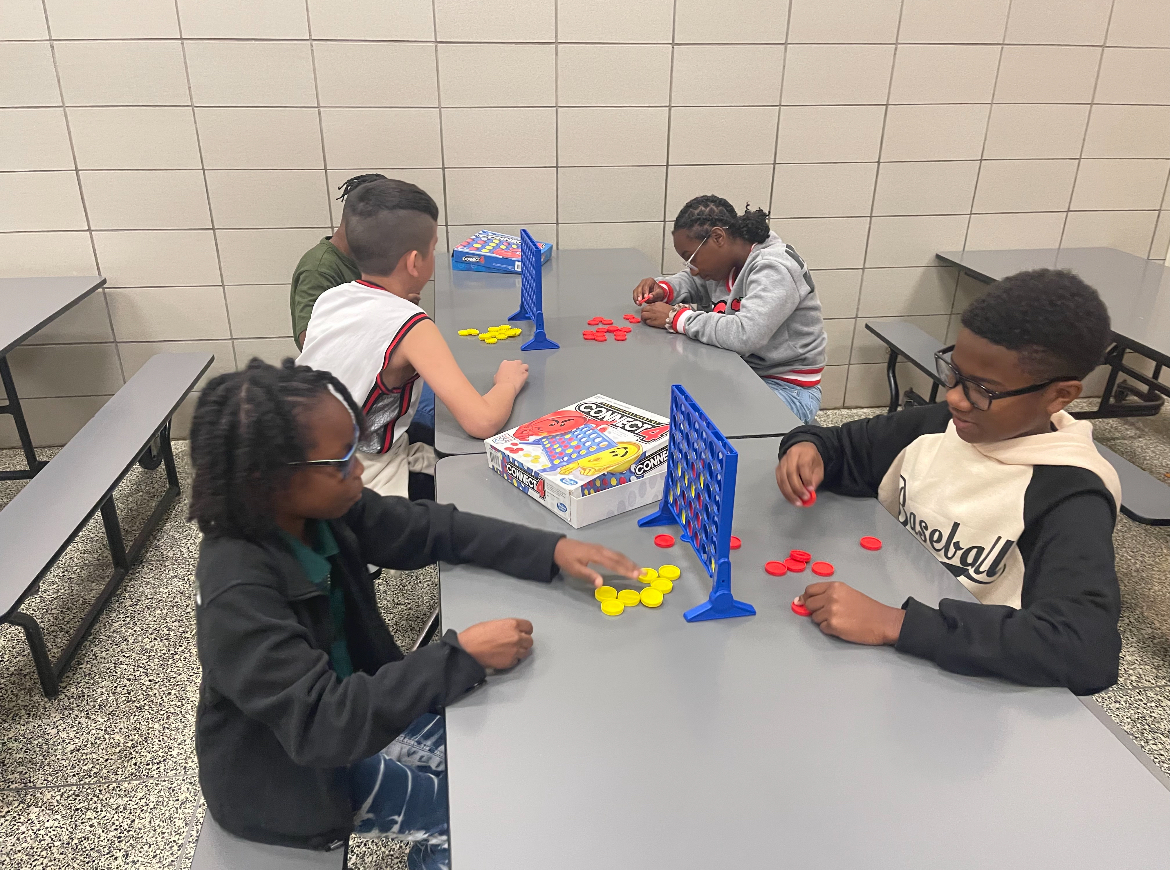 Students playing educational games